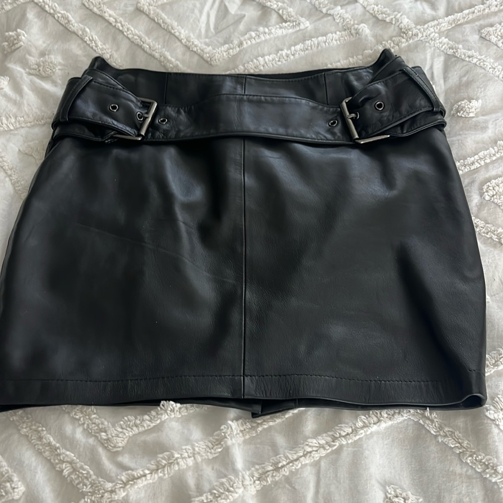 Elizabeth and James Leather Skirt with belted look in front. Silk lining.